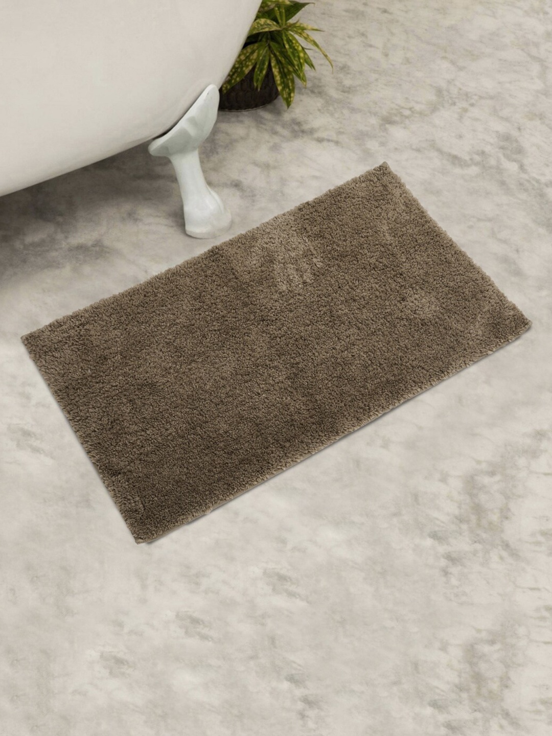 

Home Centre Brown Textured 150 GSM Rectangular Bath Mat