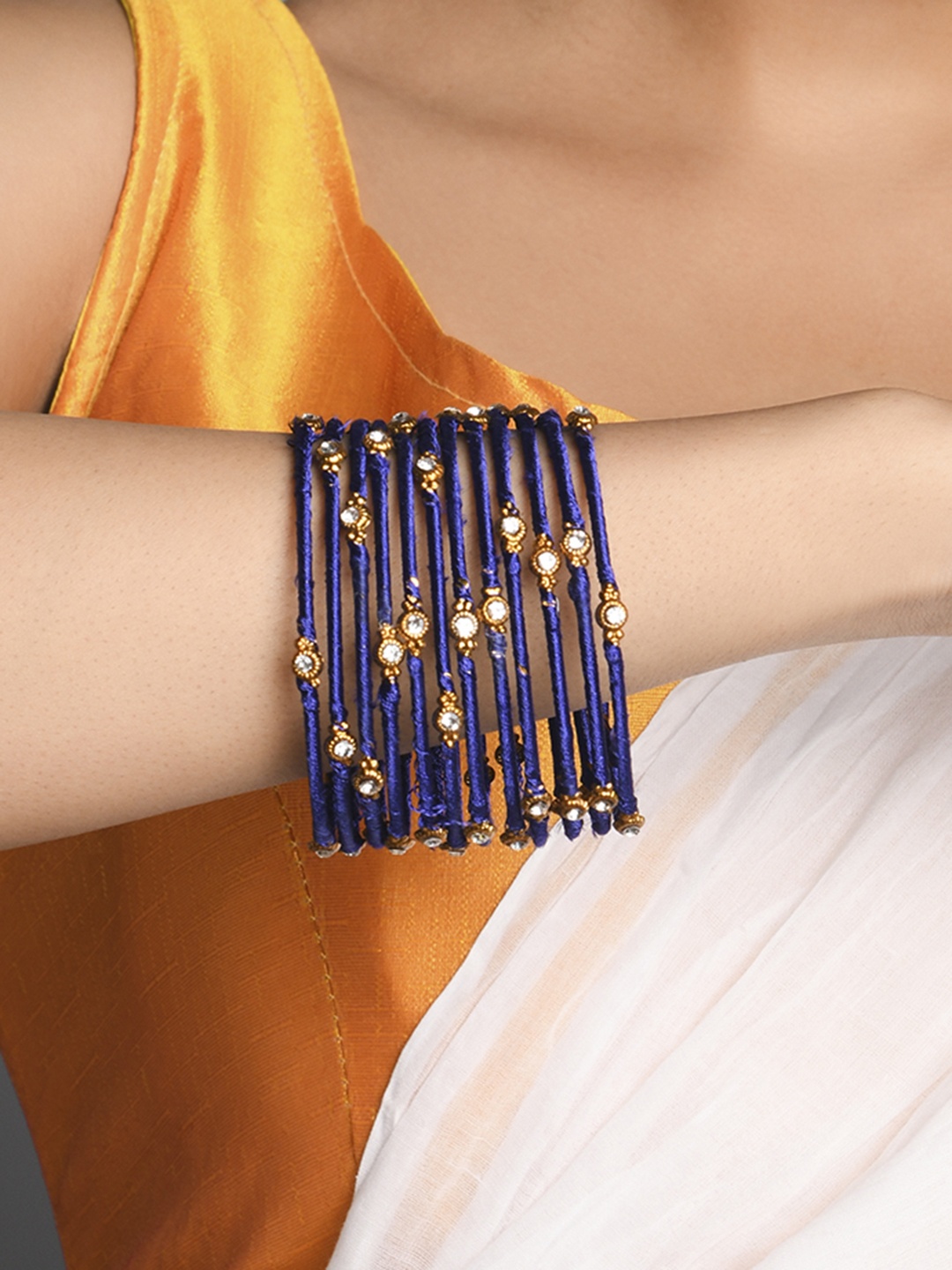 

Fida Set Of 12 Gold-Plated White Stone-Studded Navy Blue Threaded Bangles