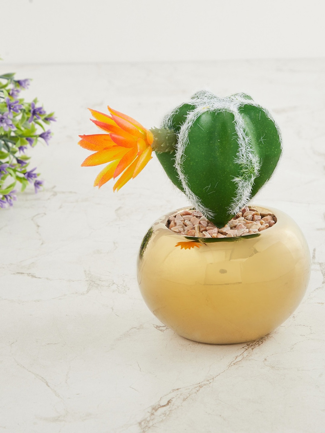 

Home Centre Green Artificial Potted Plant