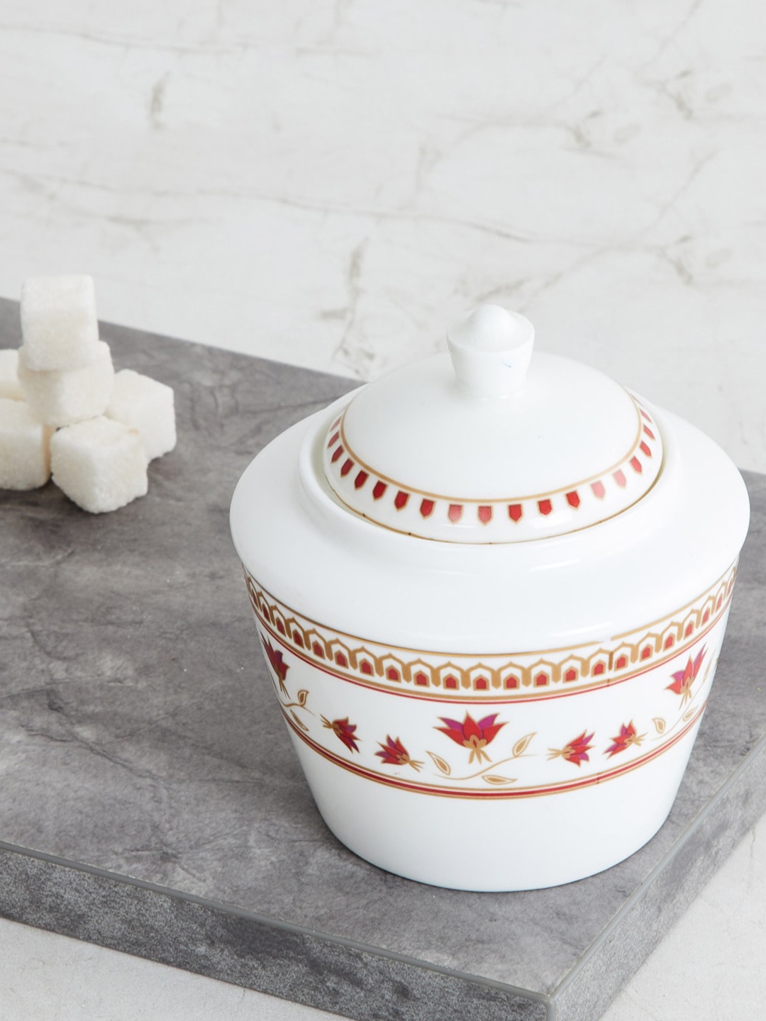 

Home Centre White & Red Printed Bone China Sugar Pot