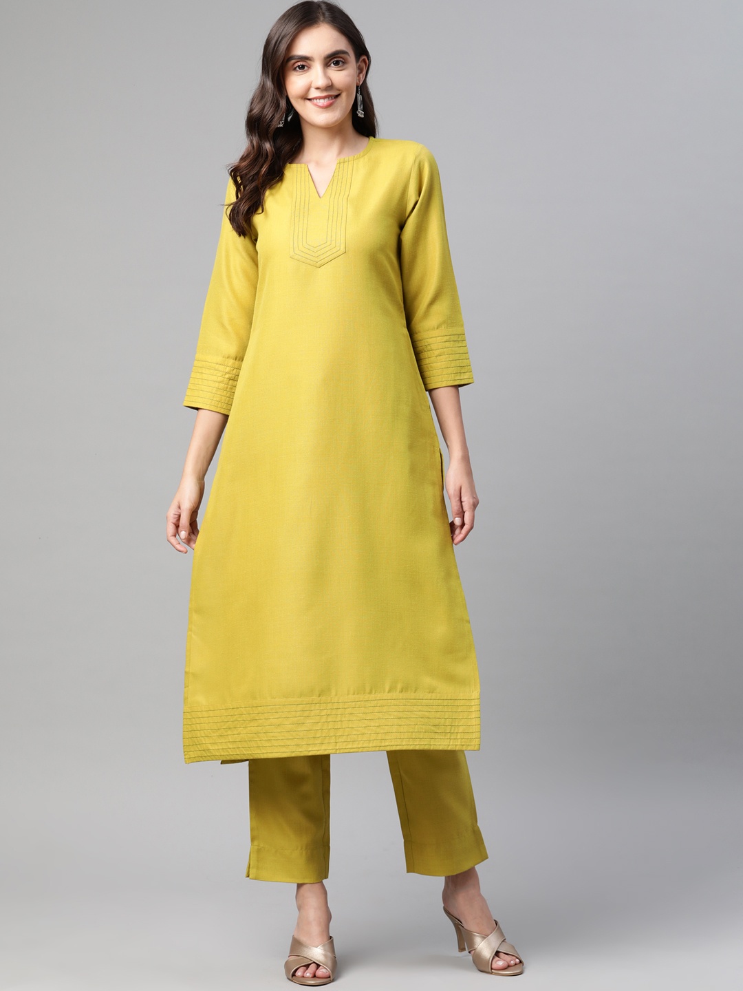 

Cottinfab Women Mustard Yellow Kurta with Trousers