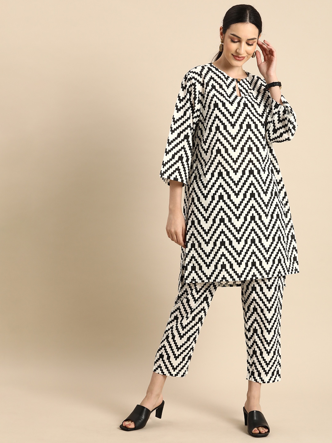 

Anouk Women White Printed Kurta with Trousers