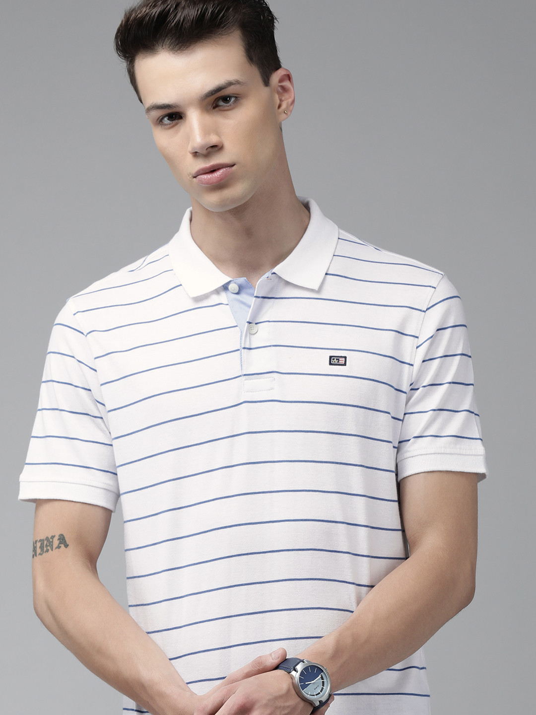 

Arrow Sport Men White Striped Polo Collar T-shirt
