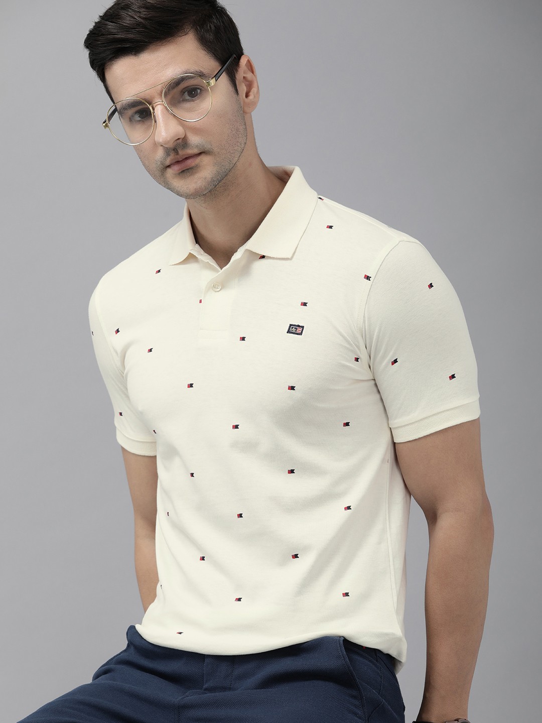 

Arrow Sport Men Off White & Black Printed Polo Collar Pure Cotton T-shirt