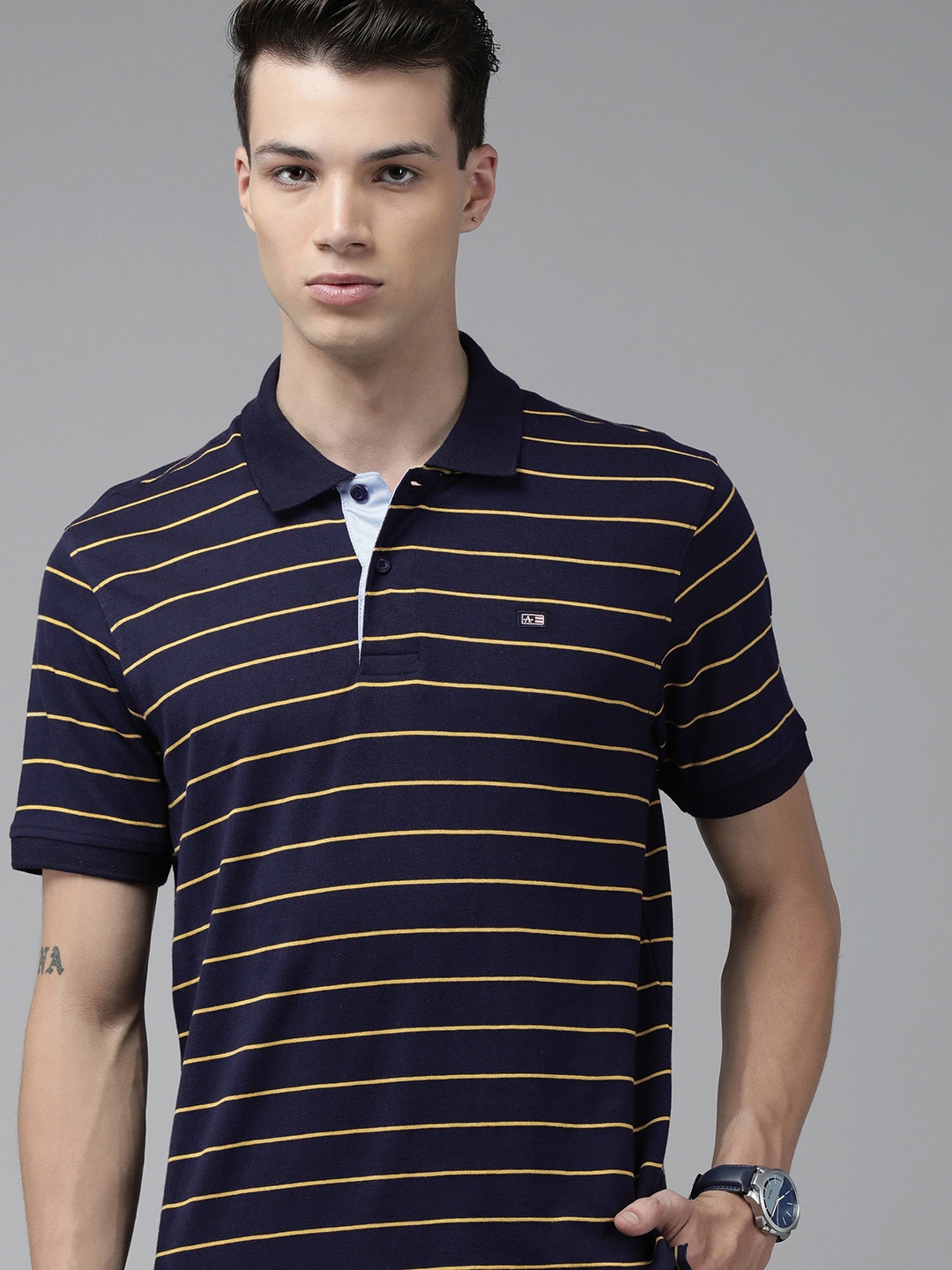 

Arrow Sport Men Blue Striped Polo Collar T-shirt