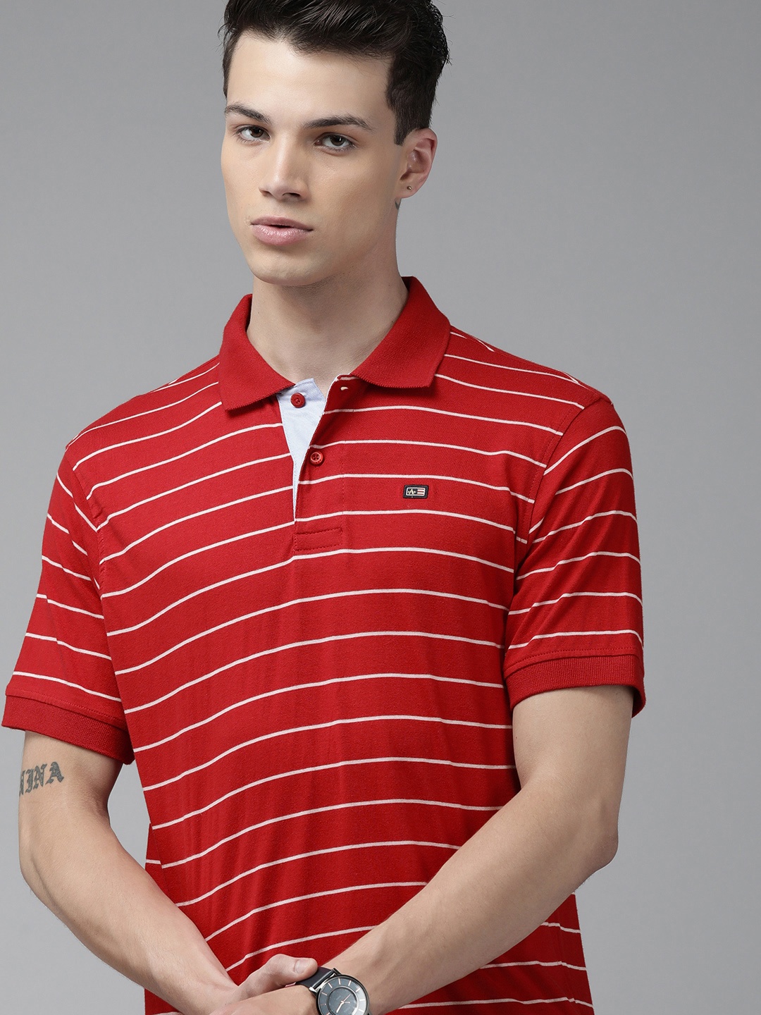 

Arrow Sport Men Red Striped Polo Collar T-shirt