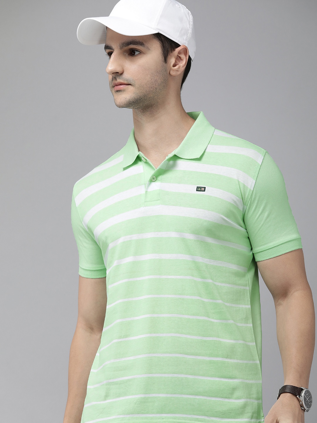 

Arrow Sport Men Sea Green & White Striped Polo Collar T-shirt