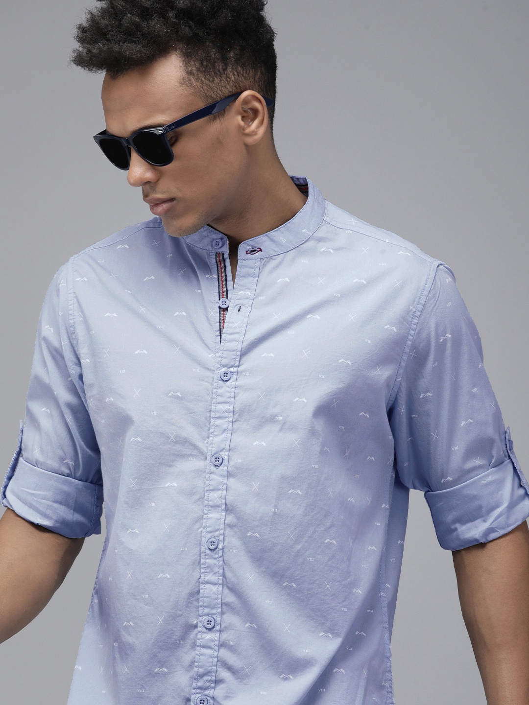 

The Roadster Lifestyle Co Men Blue Roll-Up Sleeves Printed Shirt