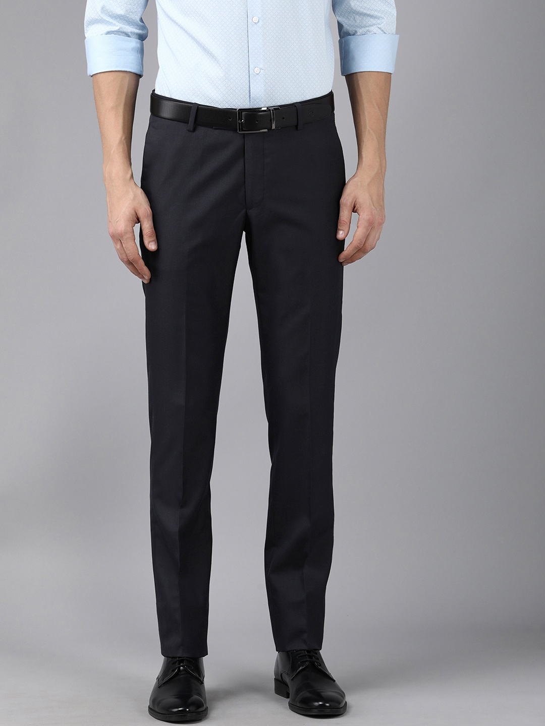 

Arrow Men Navy Blue Self Design Mid-Rise Tailored Fit Formal Trousers