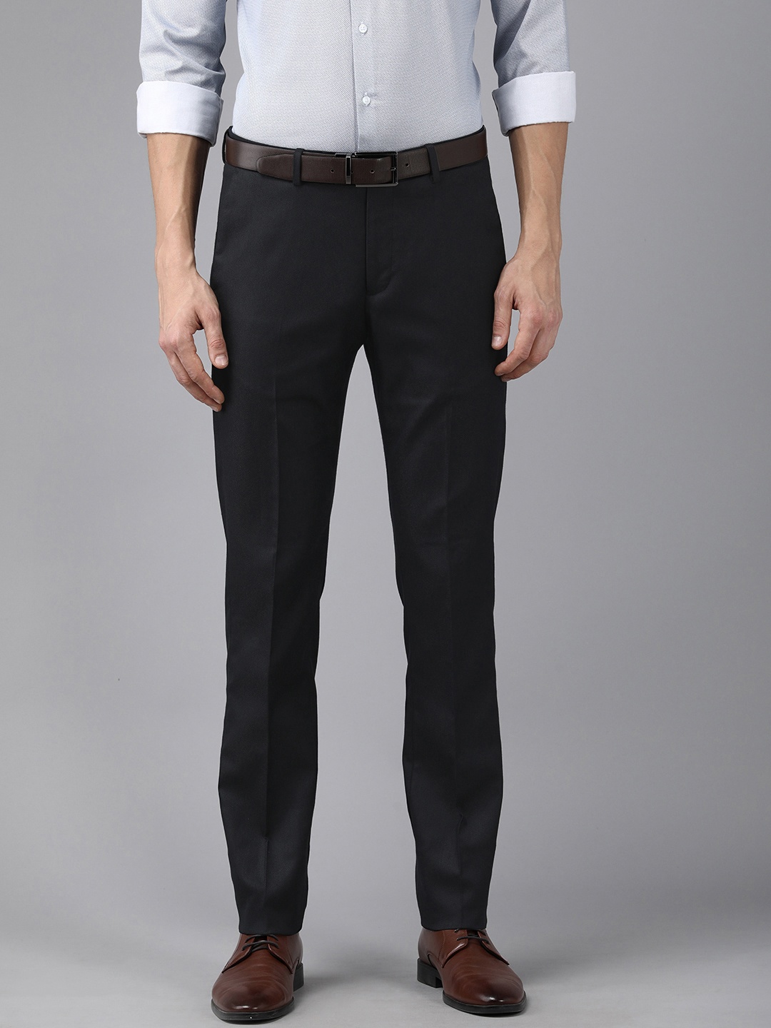 

Arrow Men Navy Blue Solid Mid Rise Formal Tailored Trousers
