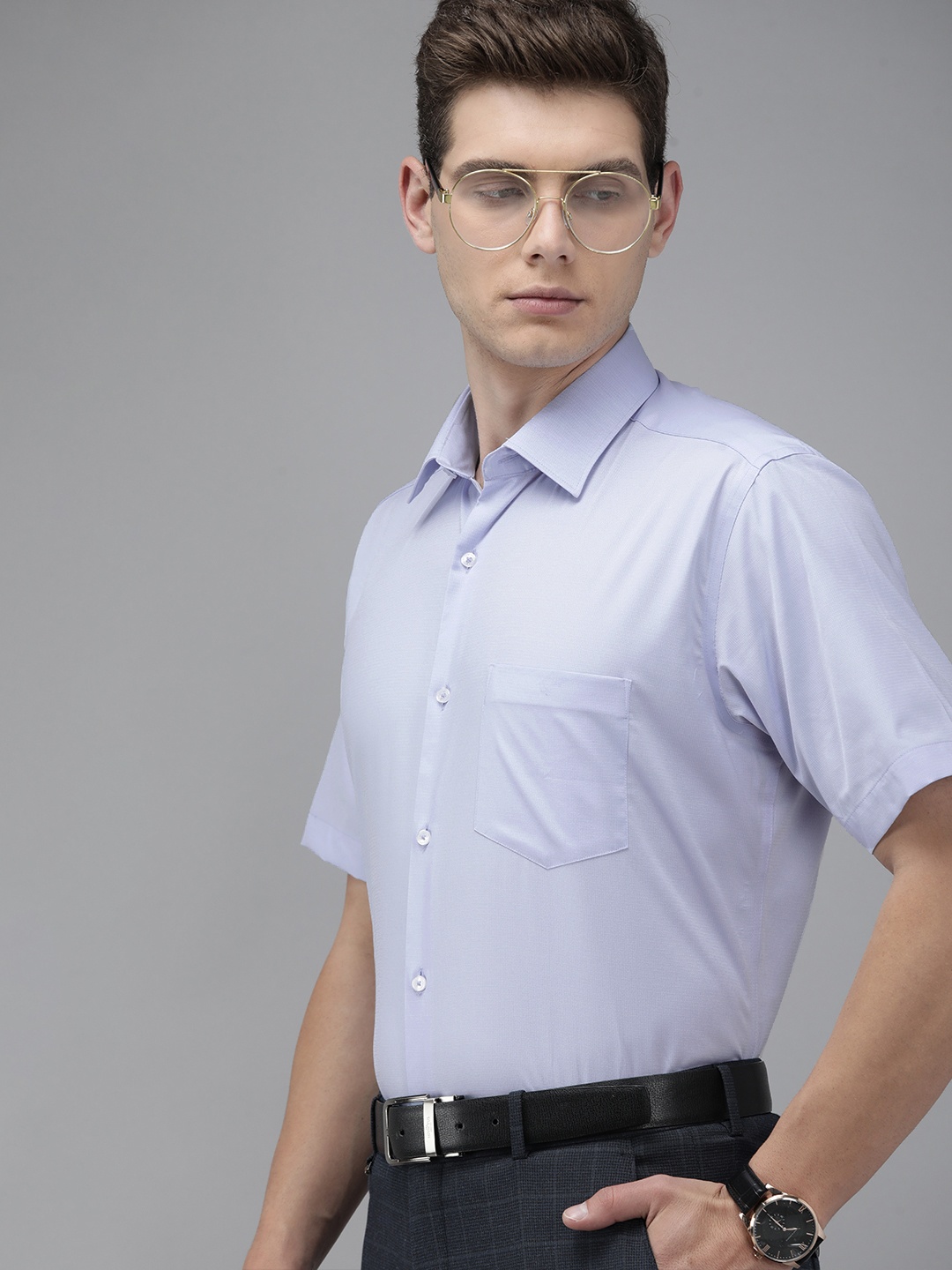 

Van Heusen Men Blue Solid Custom Fit Formal Shirt