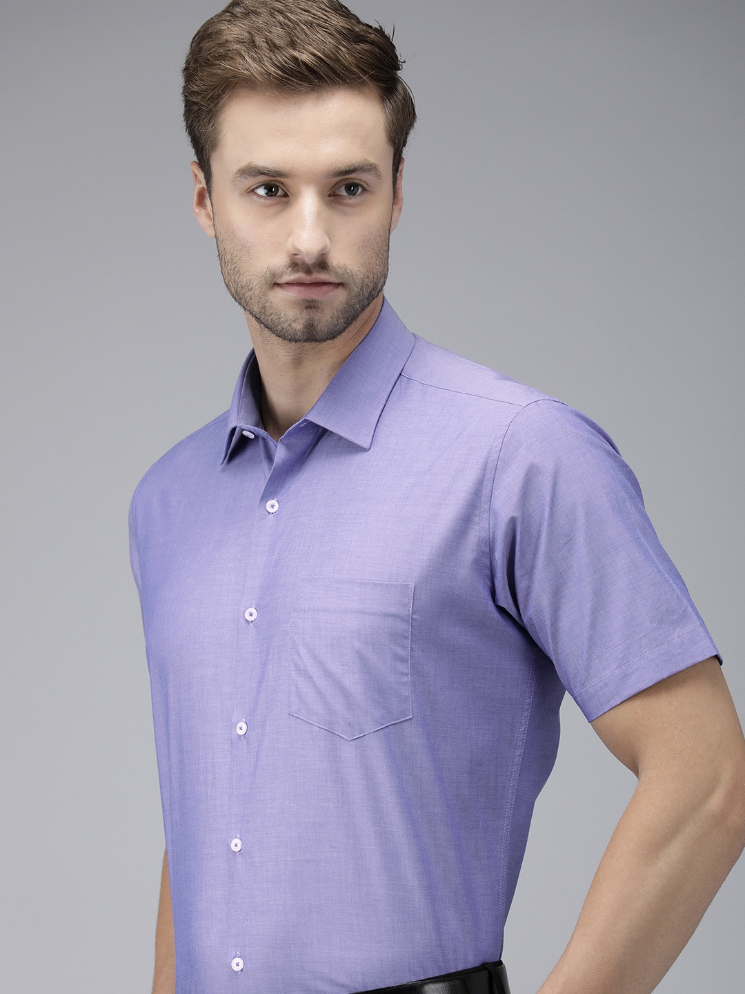 

Van Heusen Men Blue Solid Custom Fit Formal Shirt