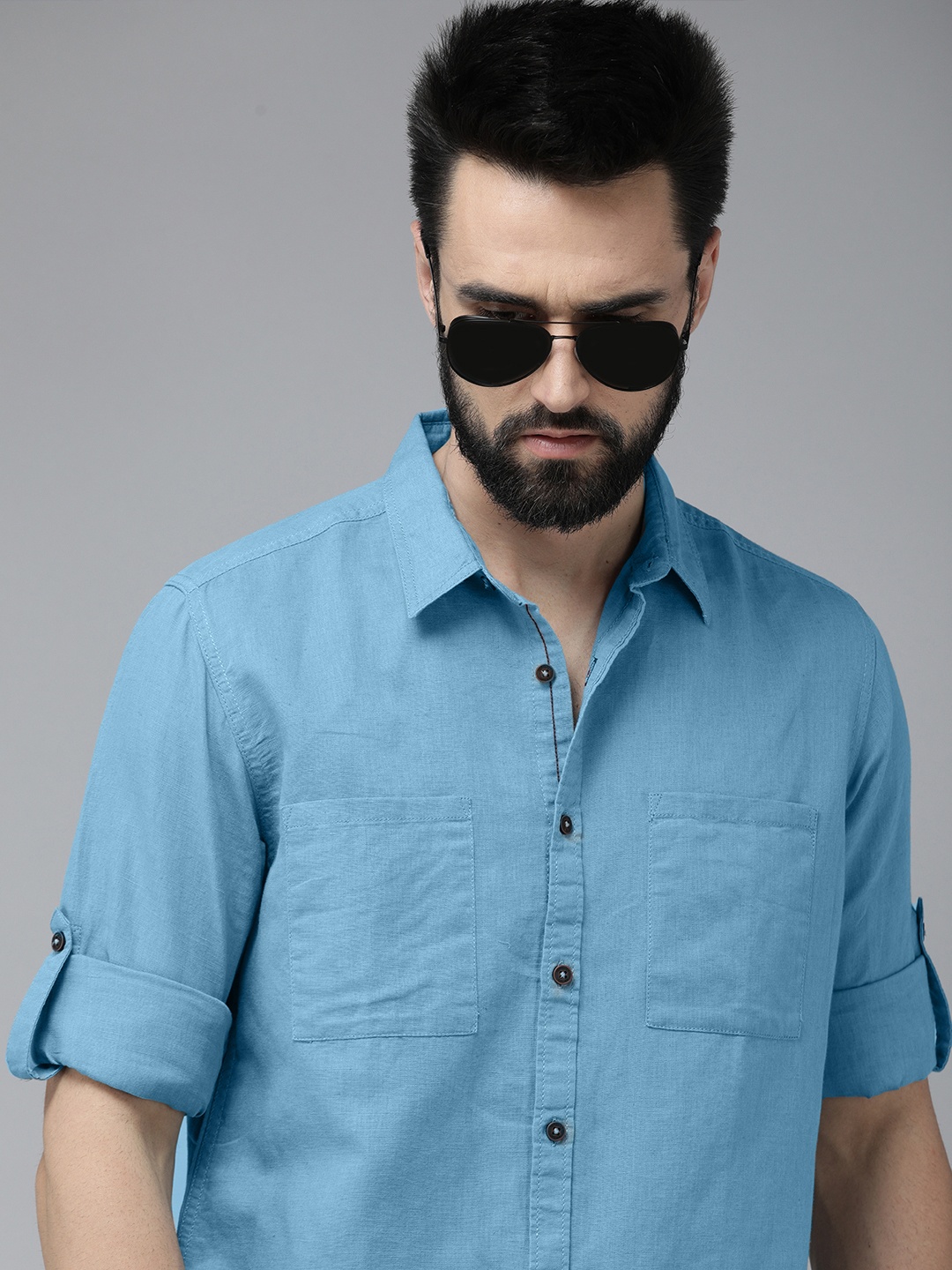 

Roadster Men Blue Roll-Up Sleeves Linen Cotton Casual Shirt