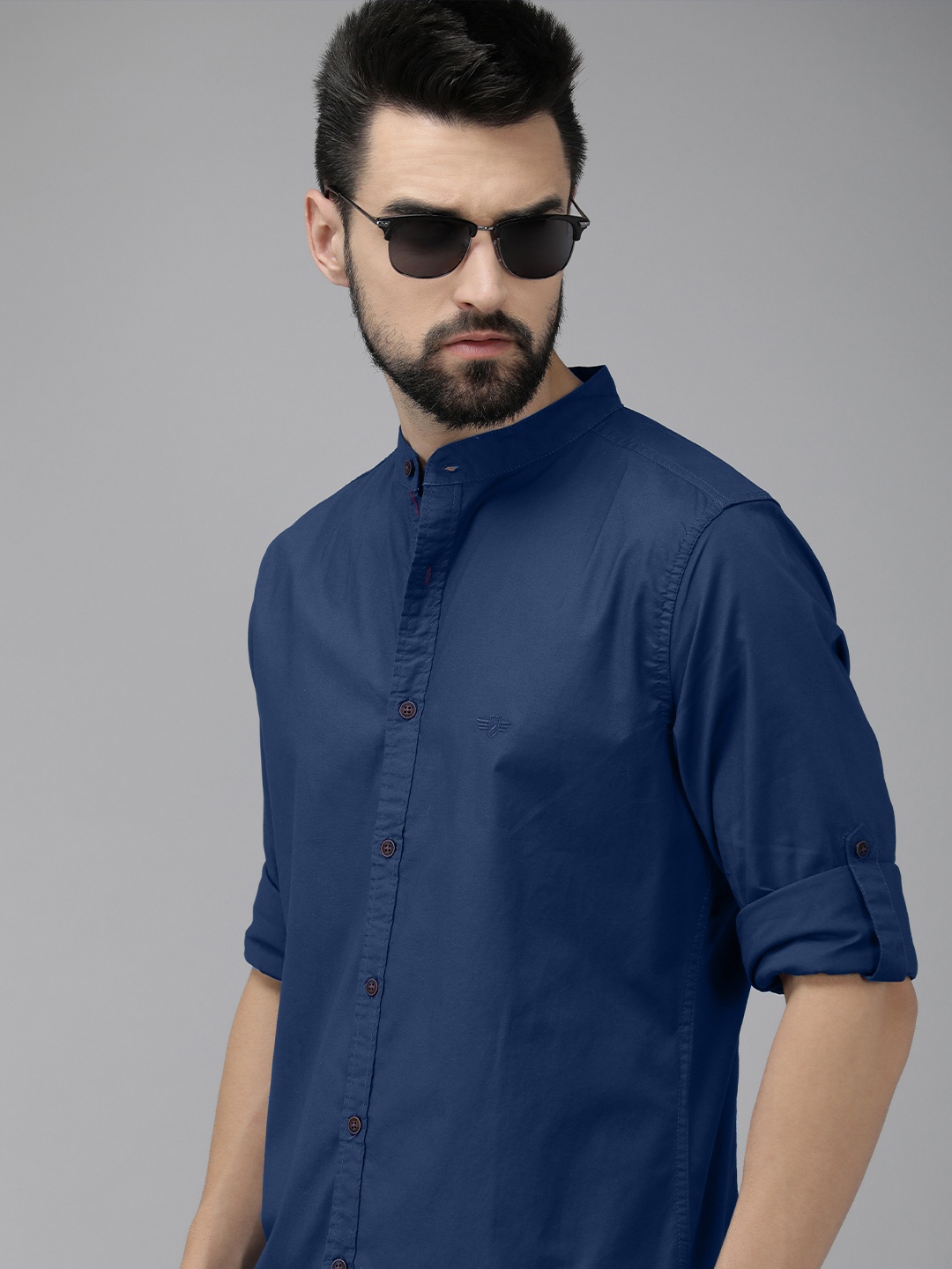 

The Roadster Lifestyle Co. Men Blue Solid Slim Fit Mandarin Collar Casual Shirt