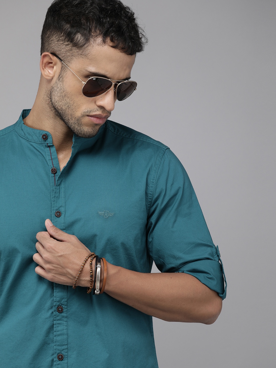 

The Roadster Lifestyle Co. Men Teal Blue Solid Mandarin Collar Casual Shirt