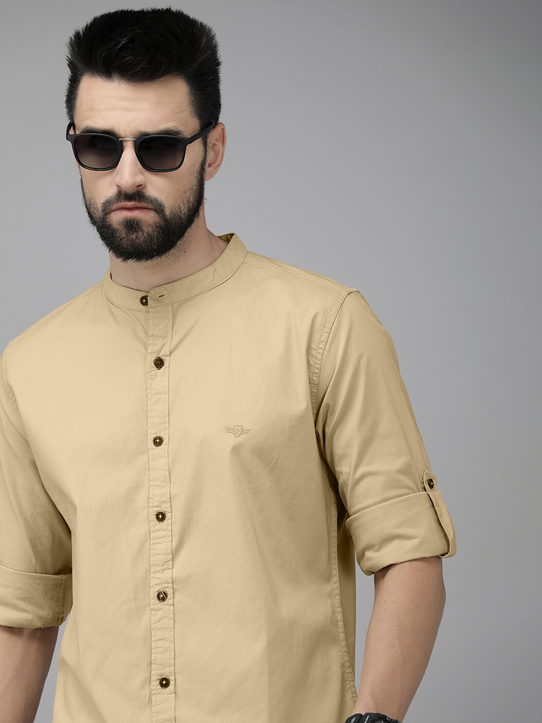 

The Roadster Lifestyle Co. Men Beige Solid Slim Fit Mandarin Collar Casual Shirt