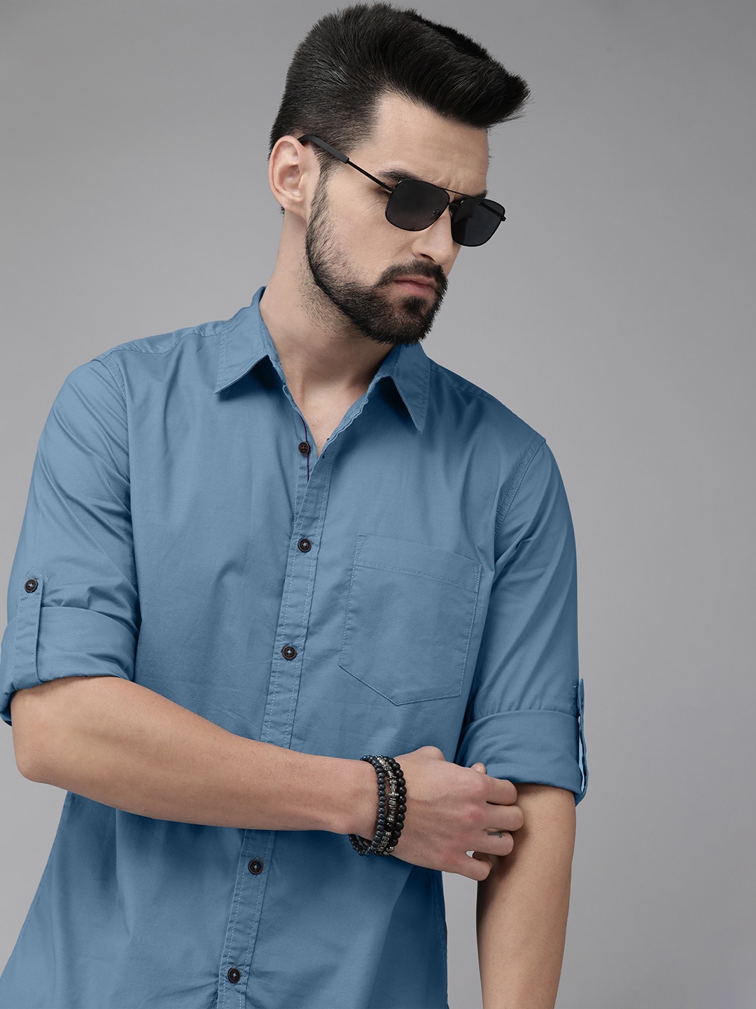 

Roadster Men Teal Blue Solid Roll-Up Sleeve Casual Shirt