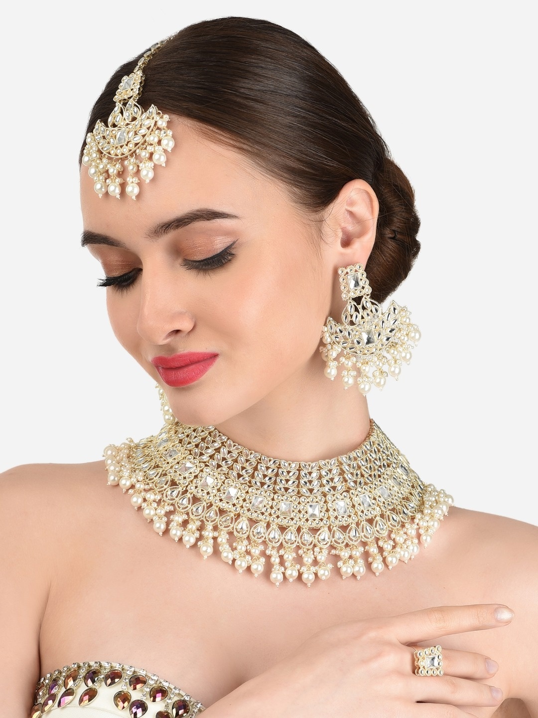 

Zaveri Pearls Women Gold-Plated & White Kundan-Studded & Pearl Beaded Bridal Jewellery Set