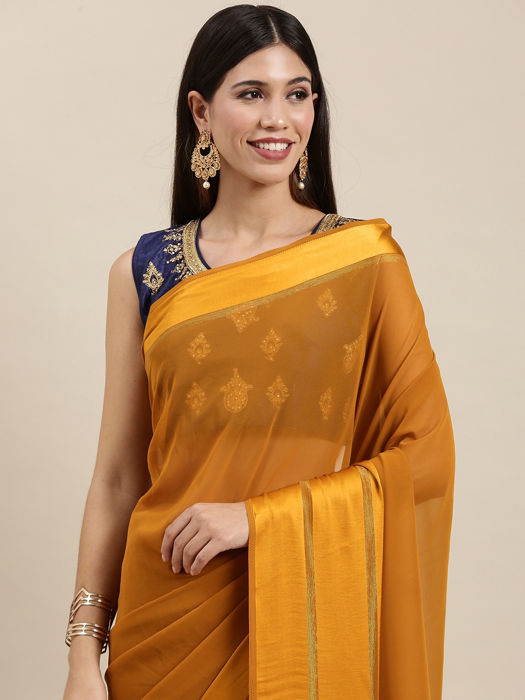 

Saree mall Mustard Yellow Georgette Solid Sarees