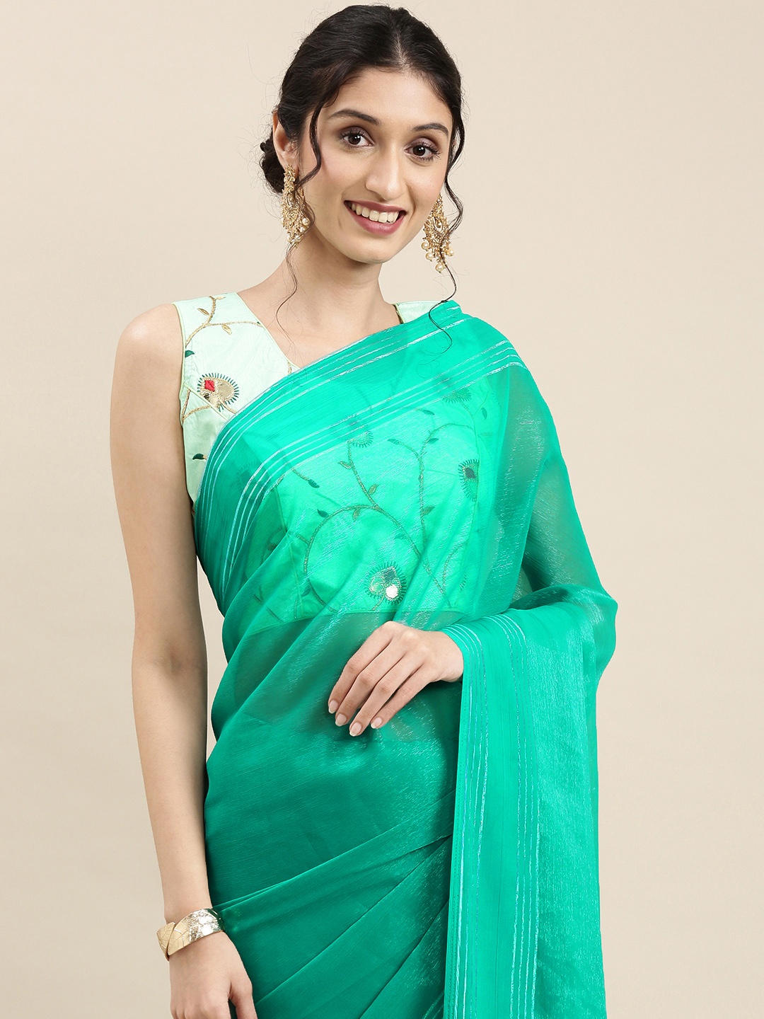 

Saree mall Sea Green Solid Georgette Sarees