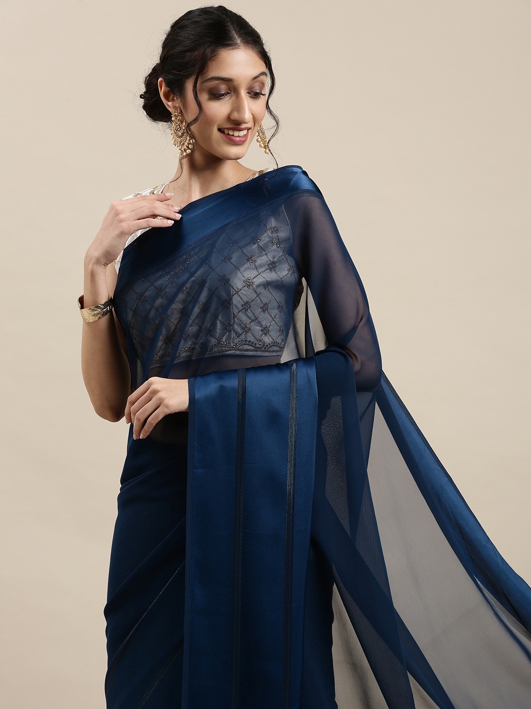 

Saree mall Navy Blue Solid Georgette Sarees