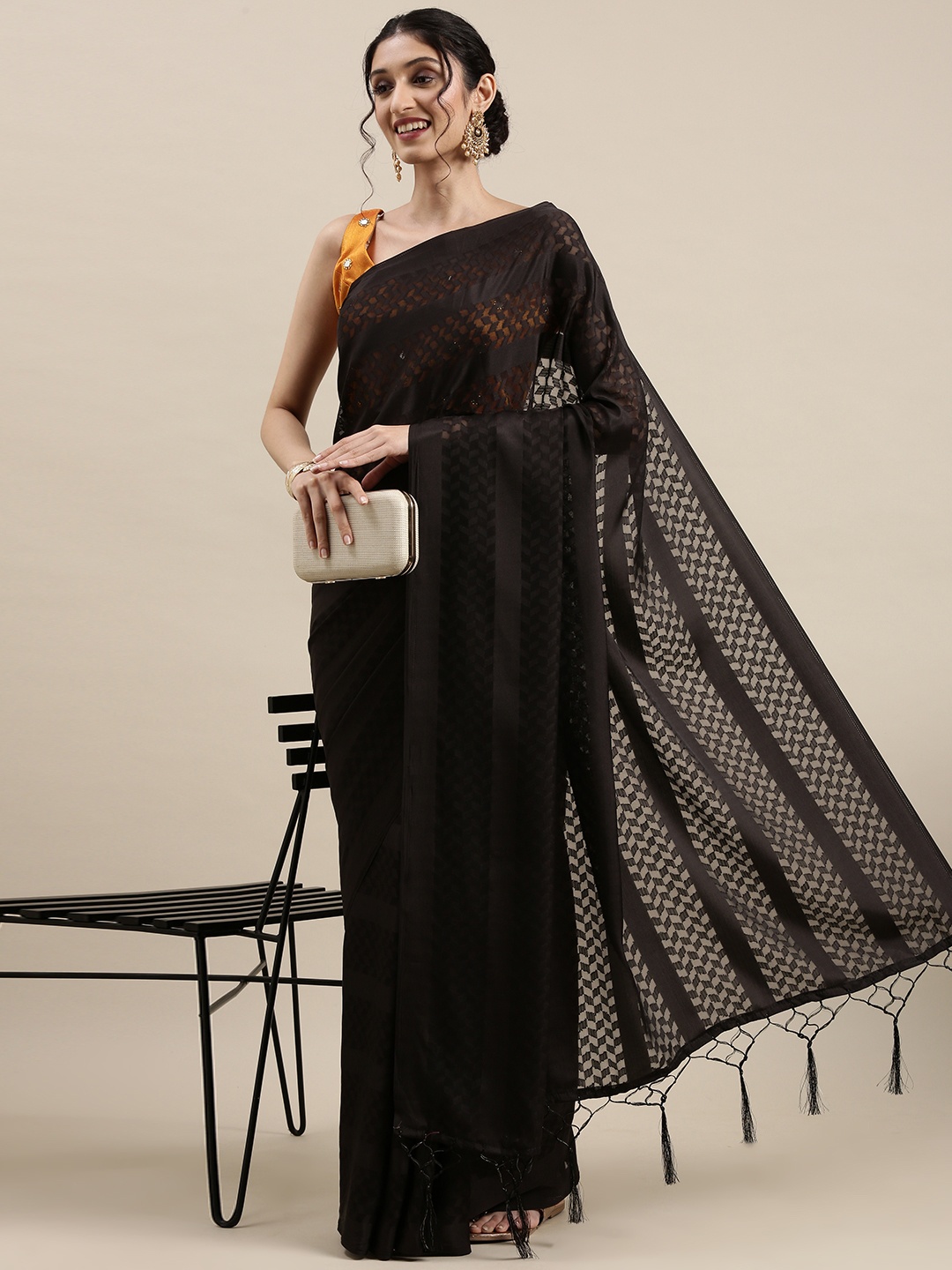 

Saree mall Black Solid Satin Sarees