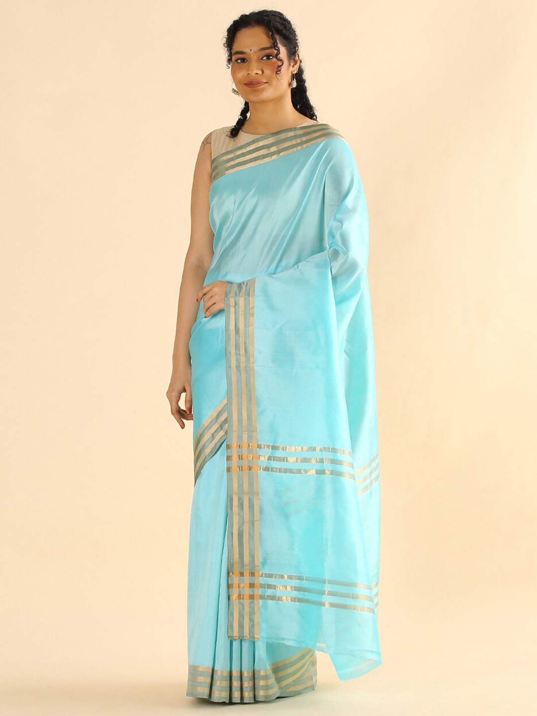 

Taneira Blue & Gold-Toned Zari Pure Silk Saree