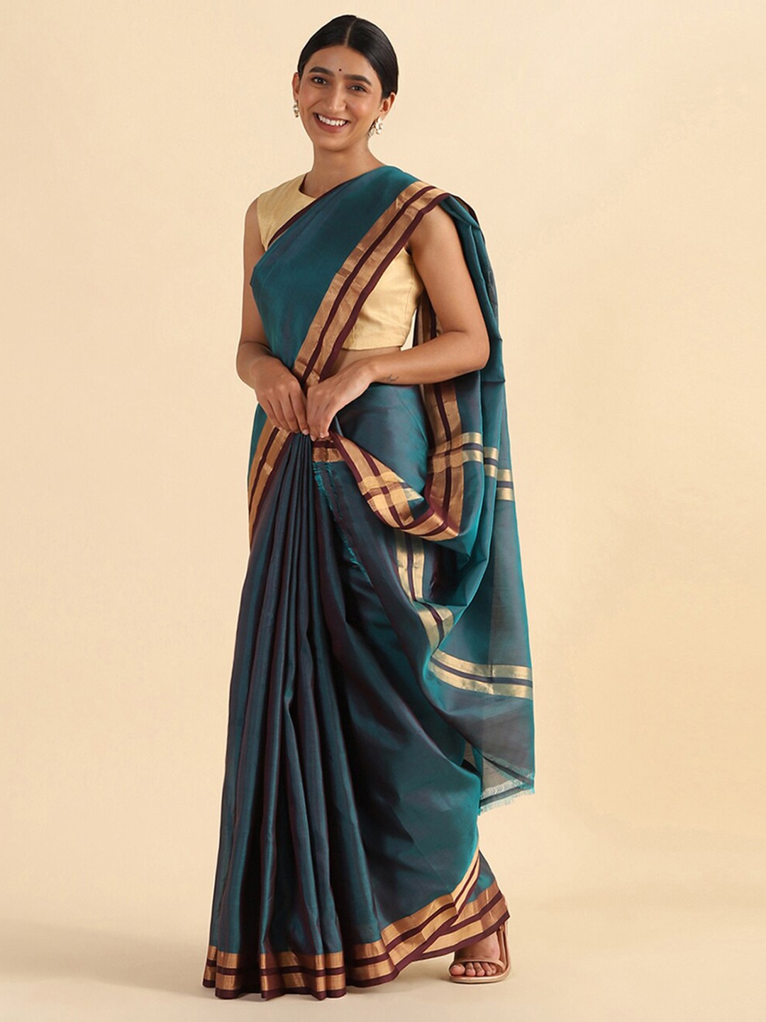 

Taneira Green & Gold-Toned Zari Pure Silk Saree