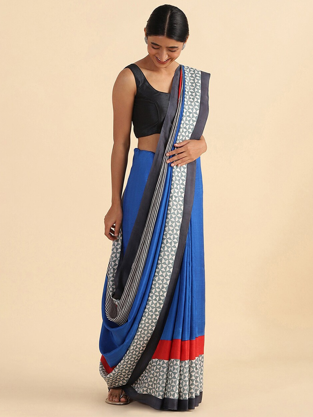 

Taneira Blue & Grey Pure Silk Block Print Saree