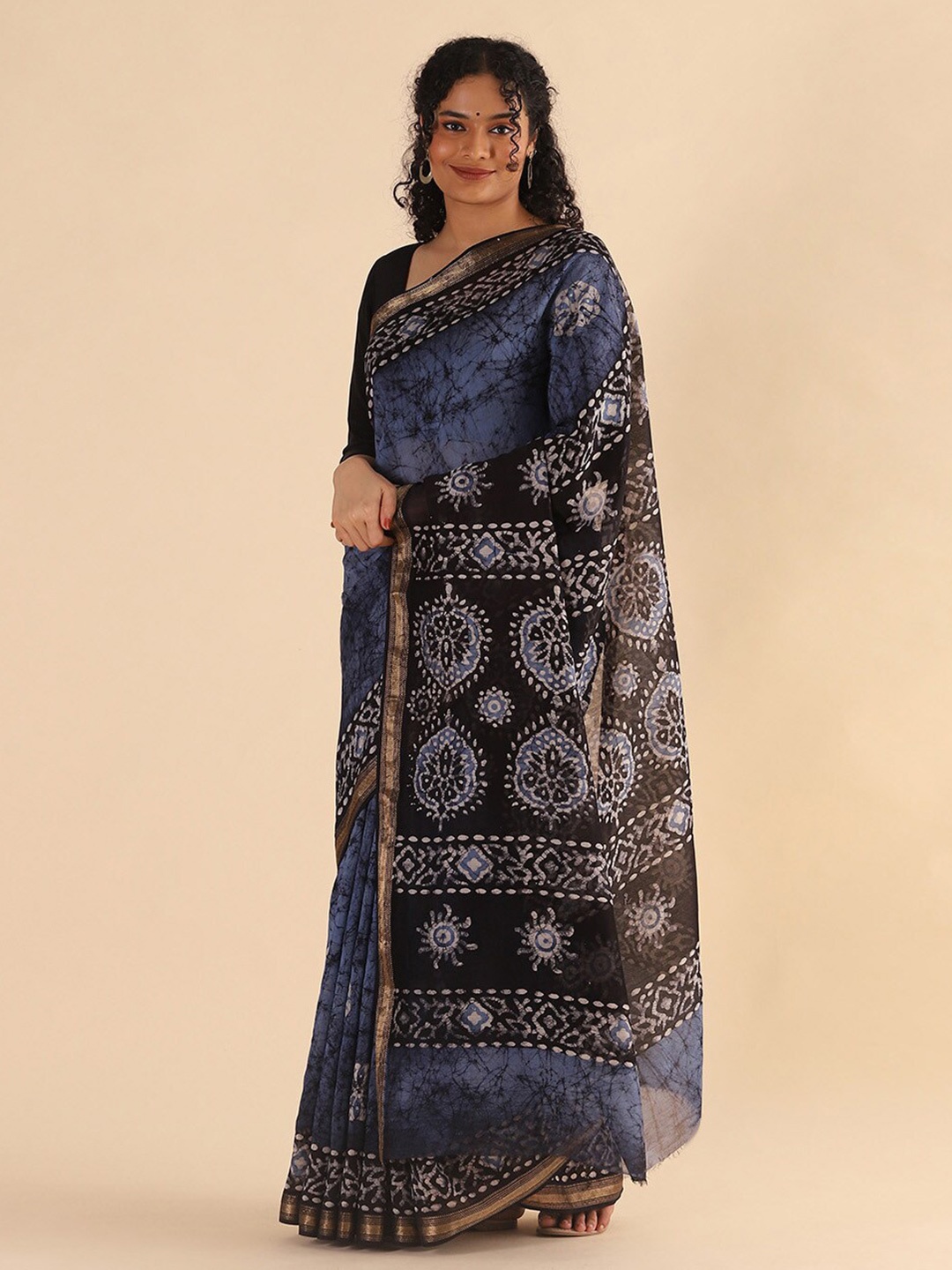 

Taneira Blue & Black Ethnic Motifs Zari Silk Cotton Saree