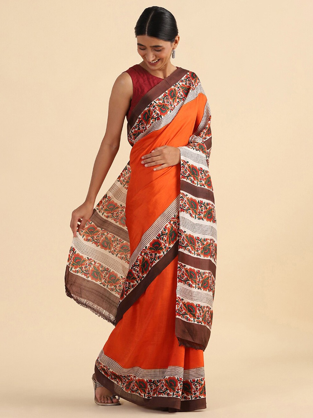 

Taneira Orange & Off-White Pure Silk Block Print Saree