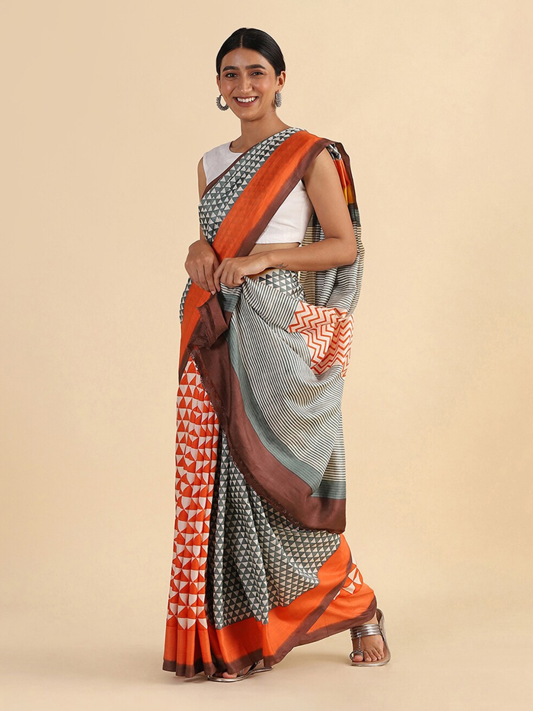 

Taneira Orange & Grey Block Printed Pure Silk Saree