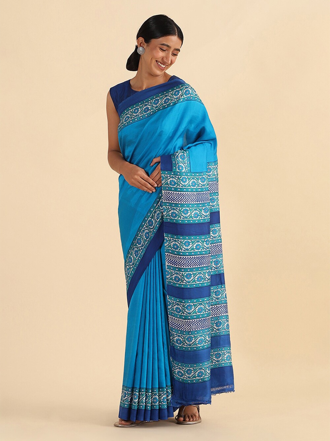 

Taneira Blue Hand Block Printed Pure Silk Saree