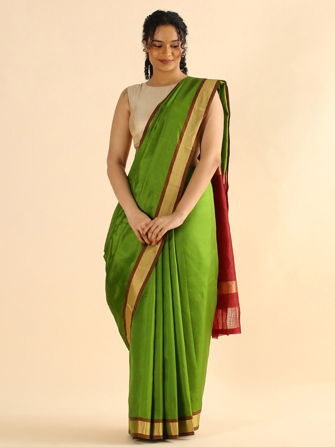 

Taneira Green & Brown Zari Pure Silk Saree