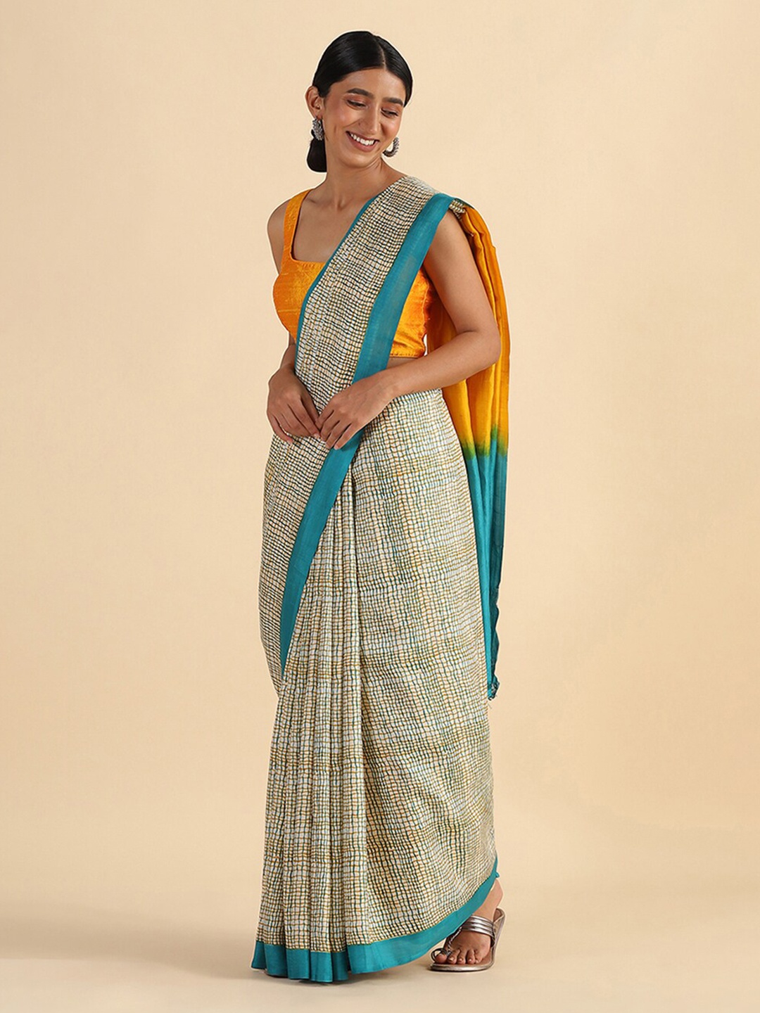 

Taneira Beige & Blue Pure Silk Block Print Saree