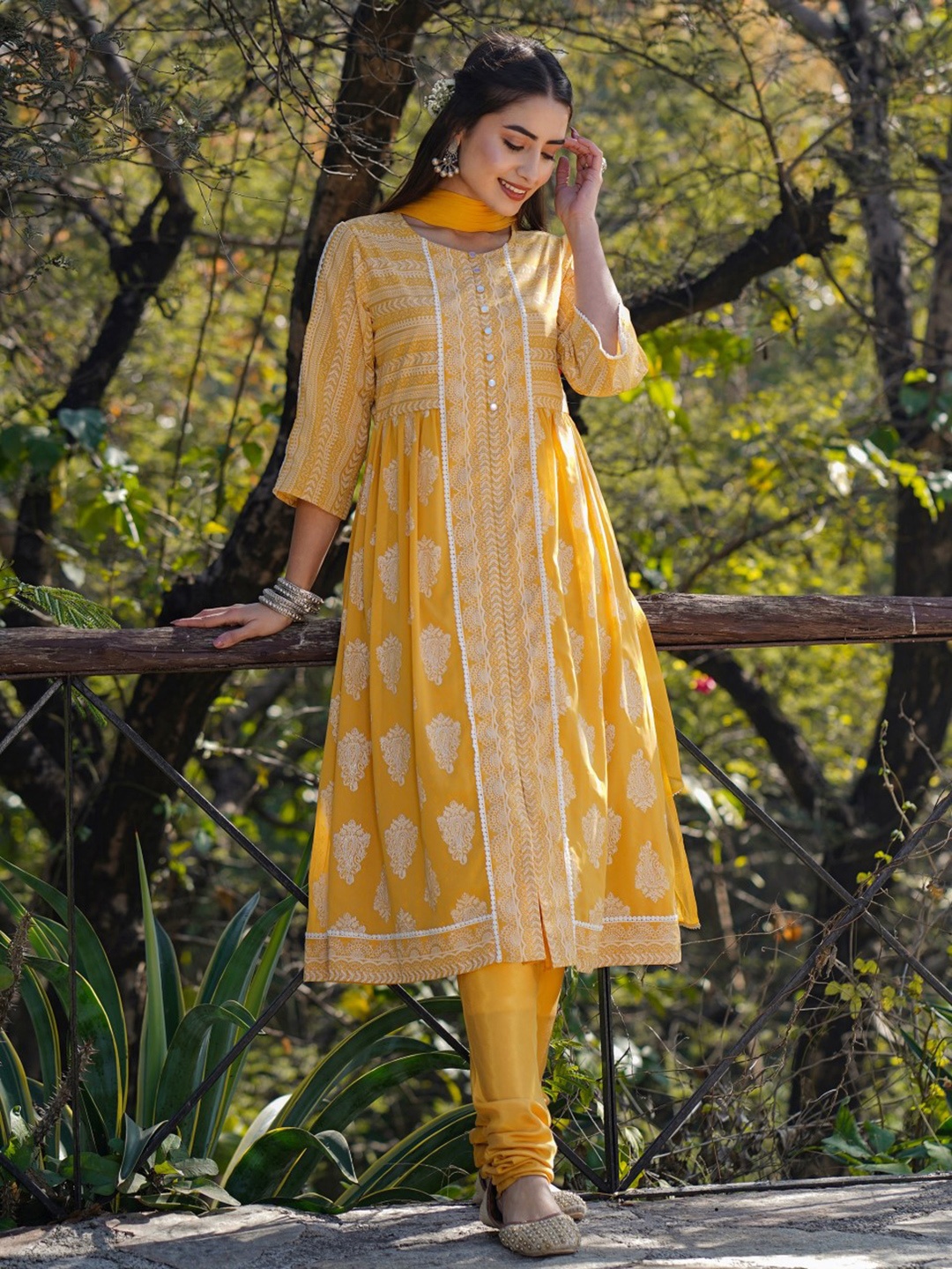 

Juniper Women Mustard Yellow Ethnic Motifs Printed Silk Georgette Flared Kurta Set