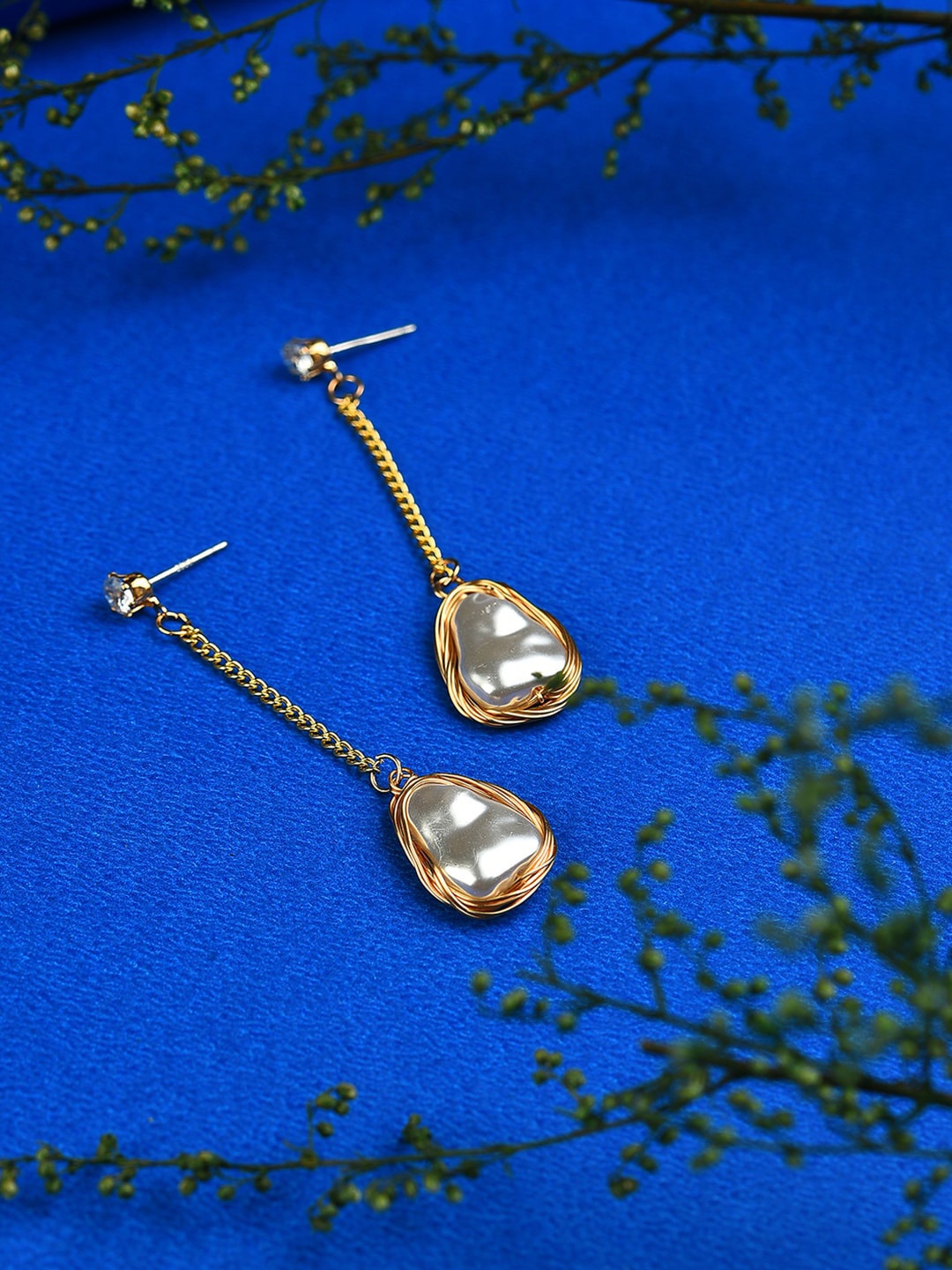 

SOHI Gold-Plated White Peal Beaded Contemporary Drop Earrings