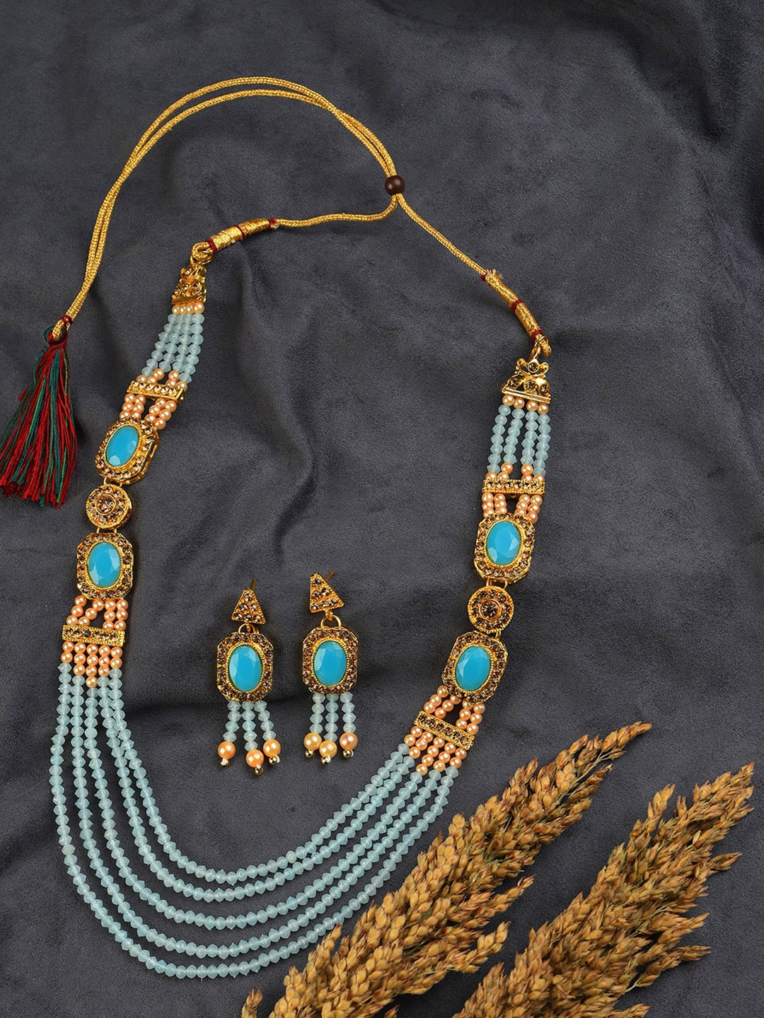 

SOHI Gold-Plated Blue Stone Studded Designer Necklace Set