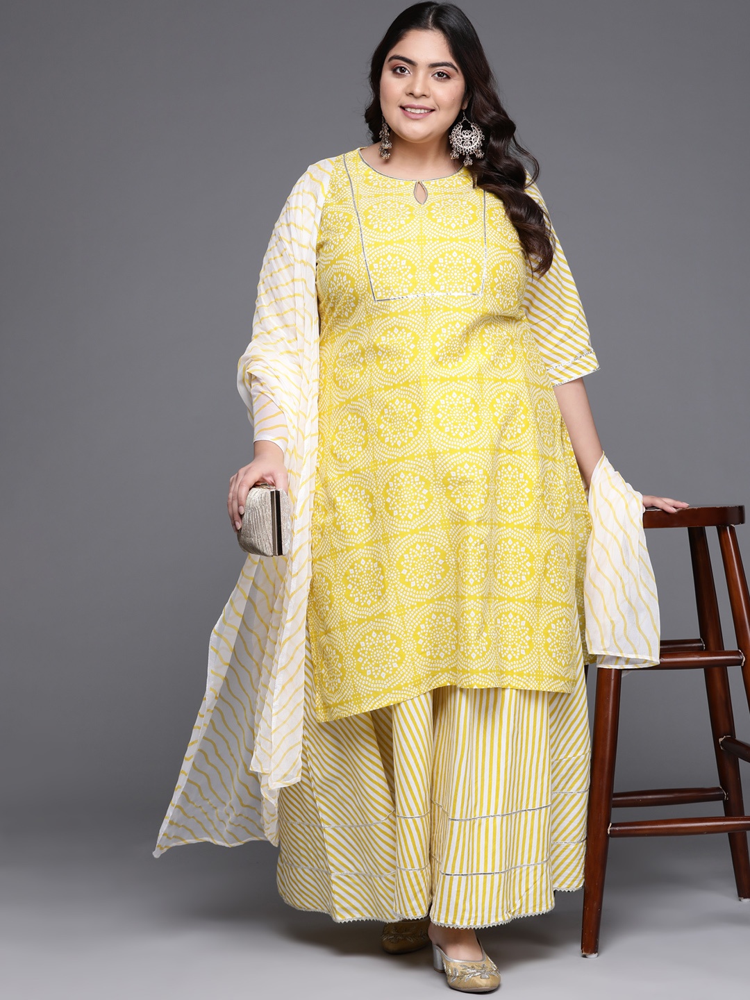 

EXTRA LOVE BY LIBAS Women Plus Size Yellow Printed Cotton Kurta with Skirt & With Dupatta