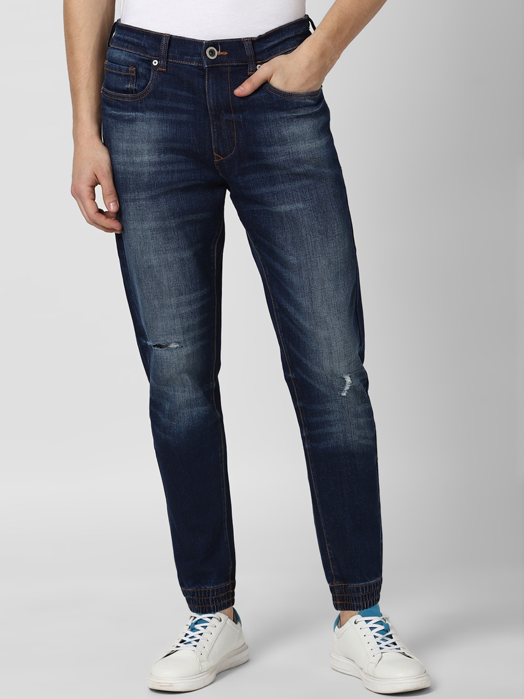 

Peter England Casuals Men Navy Blue Slim Fit Low Distress Heavy Fade Stretchable Jeans