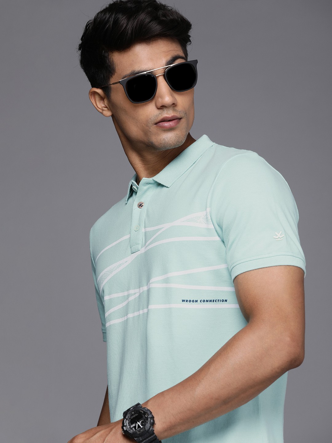 

WROGN Men Blue Printed Polo Collar Slim Fit Pure Cotton T-shirt