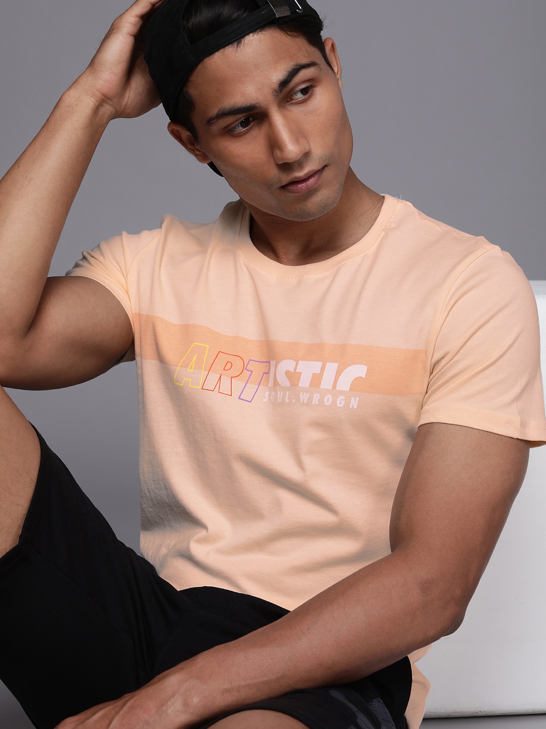 

WROGN Men Peach-Coloured Pure Cotton Typography Printed T-shirt