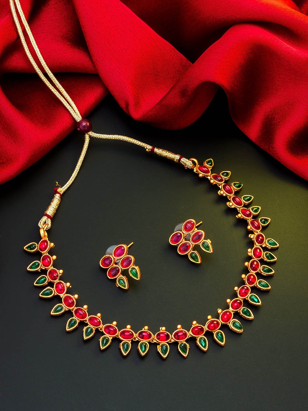 

aadita Gold-Toned Pink & Green Stone-Studded & Beaded Meenakari Jewellery Set
