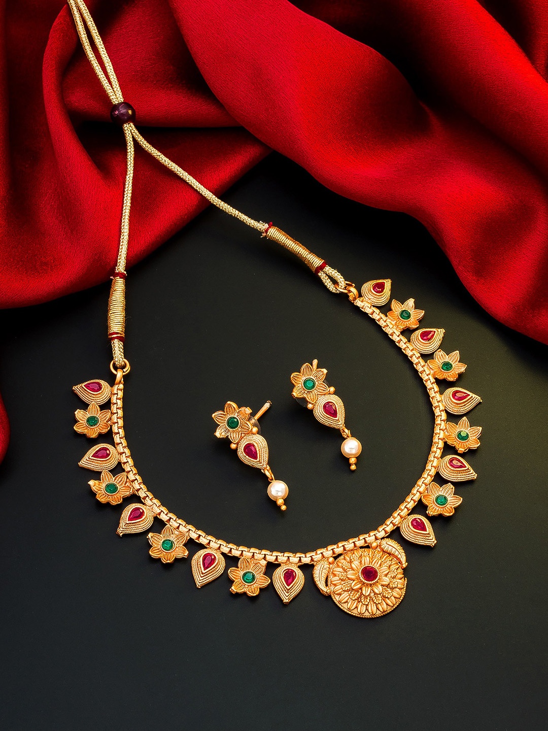 

aadita Gold-Toned Pink & Green Stone-Studded & Beaded Meenakari Jewellery Set