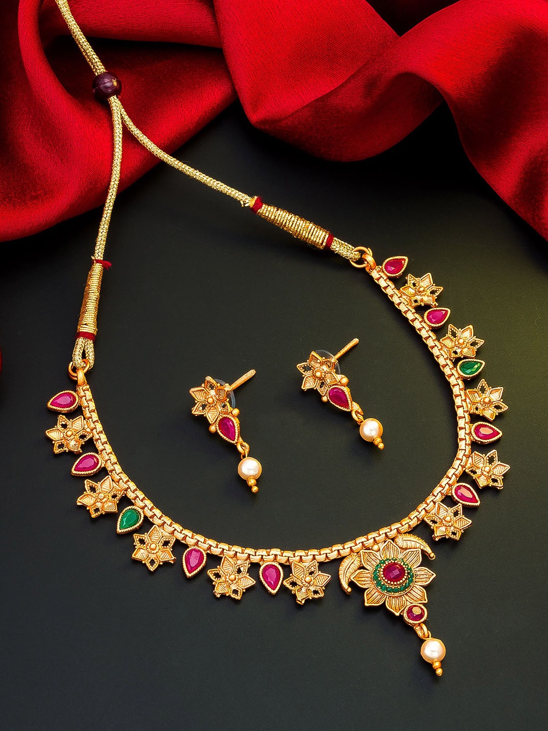 

aadita Gold-Toned Pink & Green Stone-Studded & Beaded Meenakari Jewellery Set