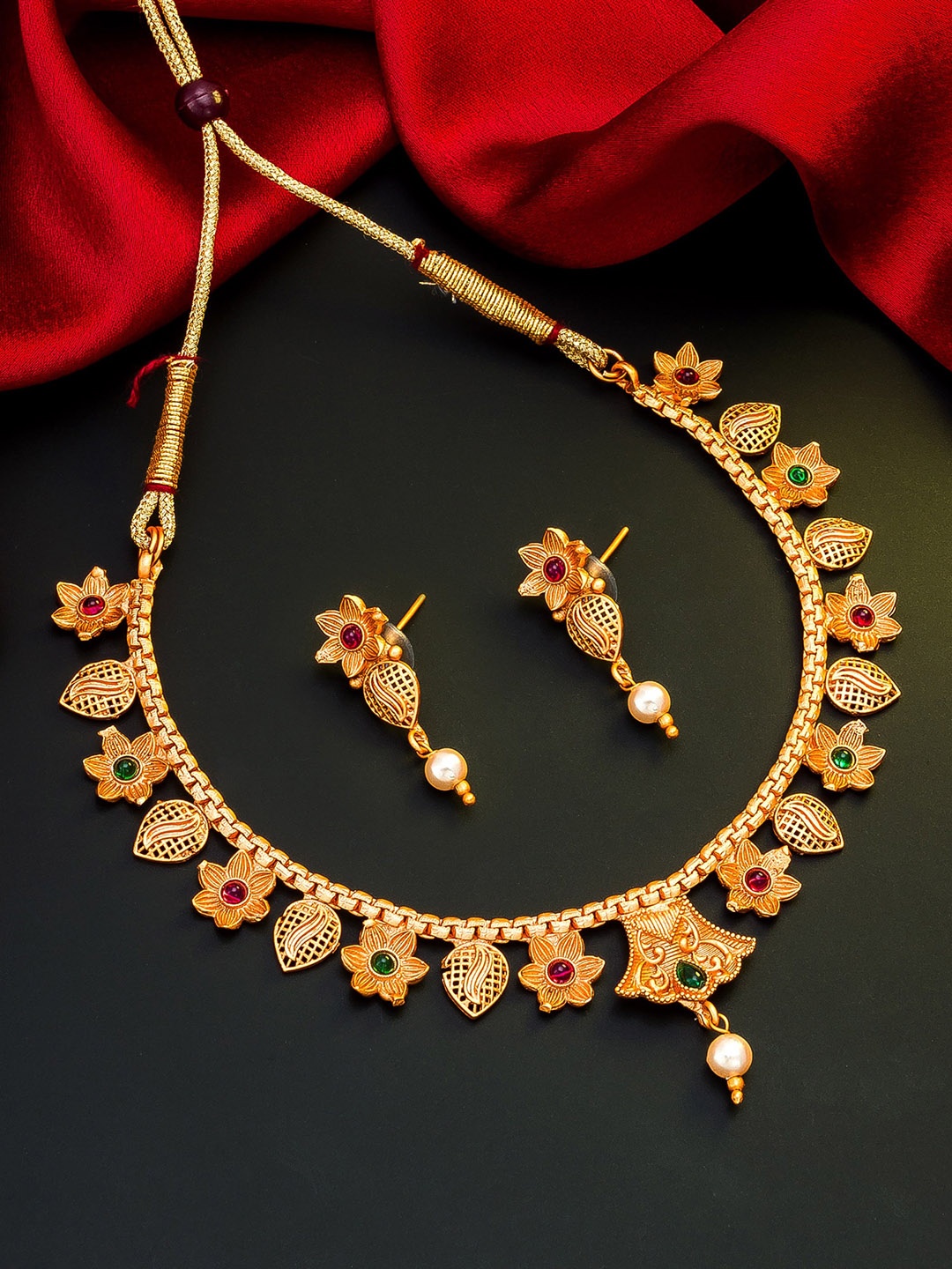 

aadita Gold-Toned Pink & Green Stone-Studded & Beaded Meenakari Jewellery Set