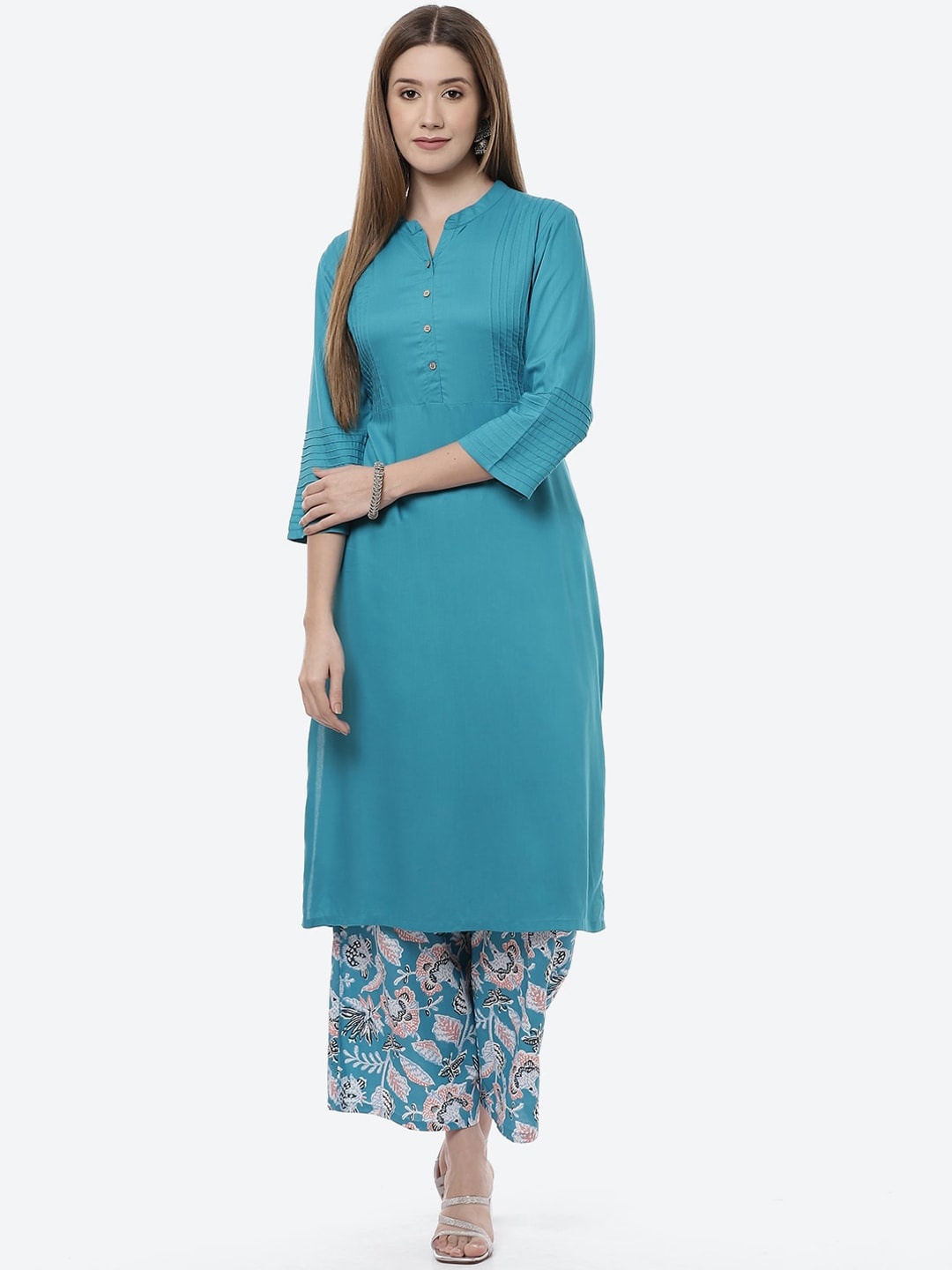 

Rangriti Women Turquoise Blue Floral Panelled Kurta with Palazzos