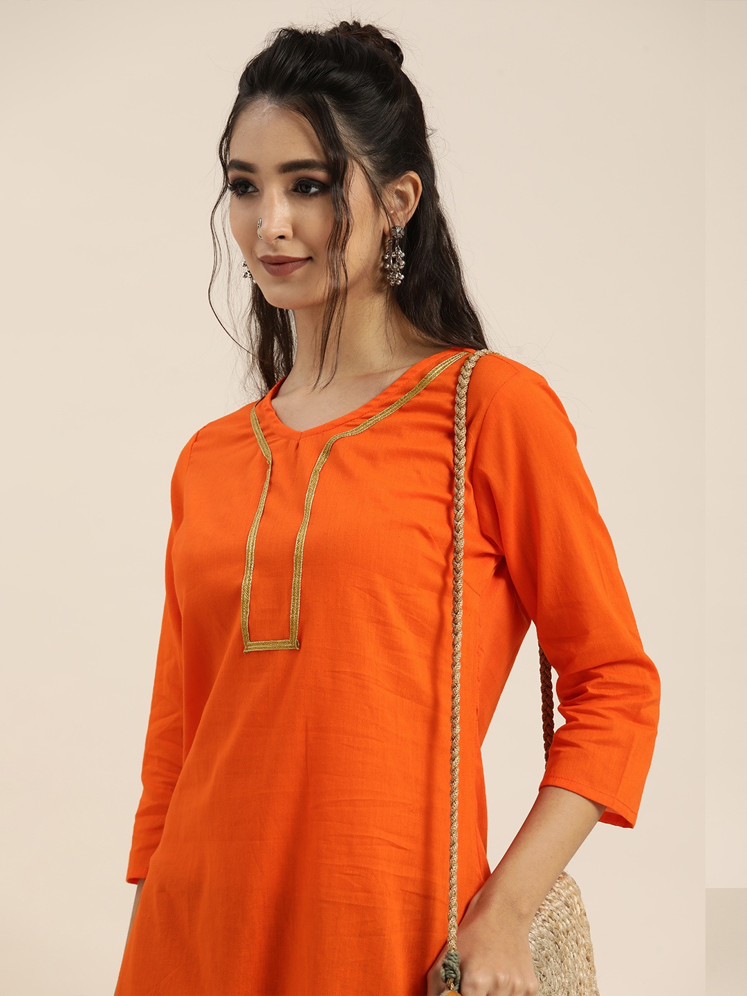 

Sangria Women Orange & Black Solid Pure Cotton Gotta Patti Kurta with Printed Trousers