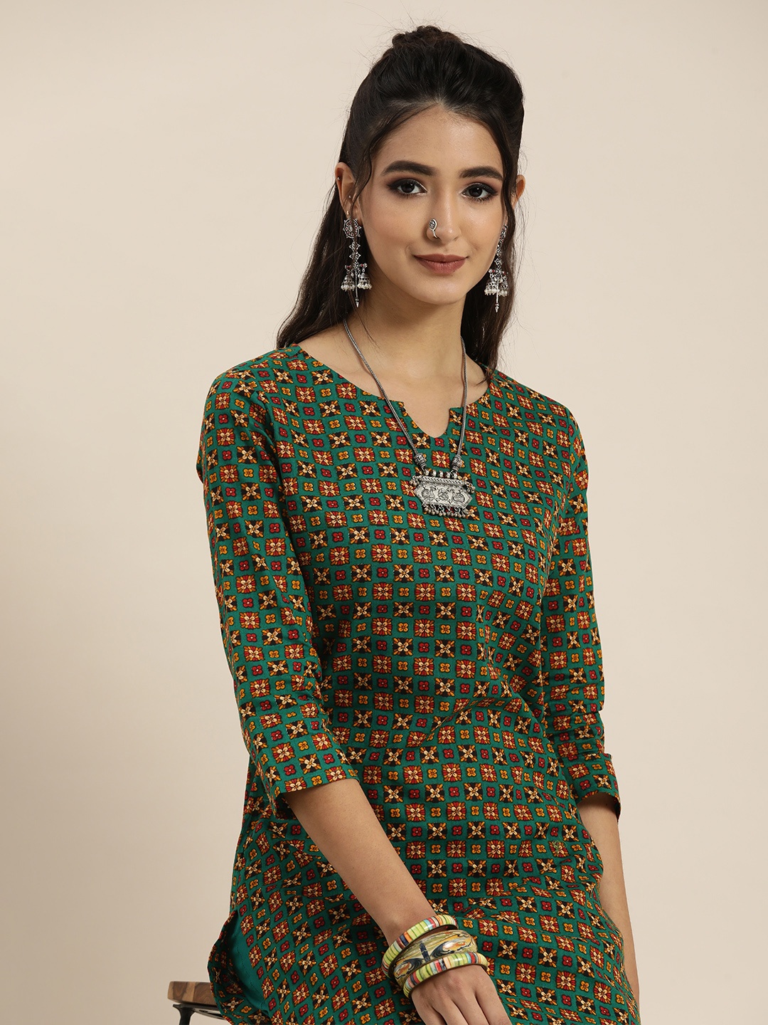 

Sangria Women Green & Orange Bnadhani Print Pure Cotton Kurta with Trousers