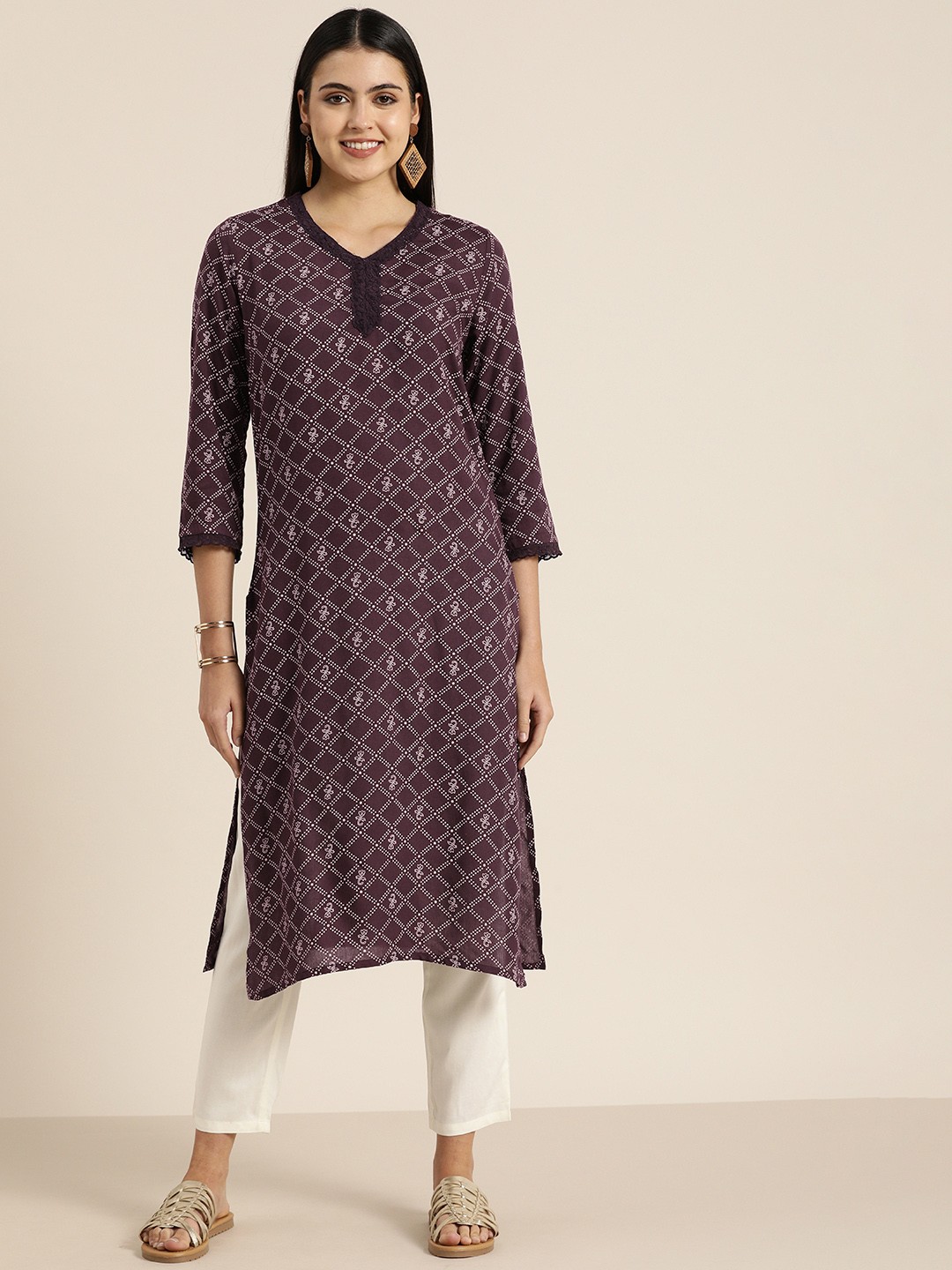 

Sangria Women Burgundy & White Ethnic Motifs Printed Kurta with Trousers